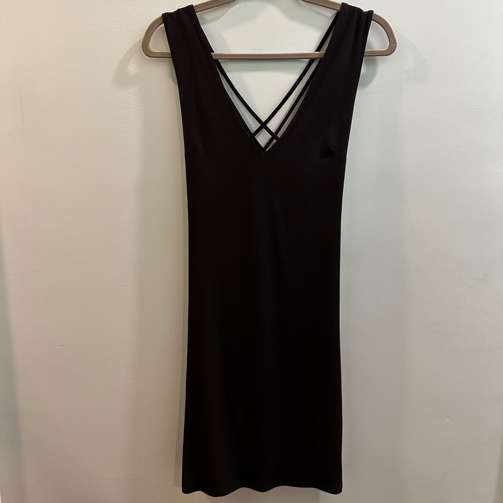 Business in the front, party in the back! Perfect day to night dress.